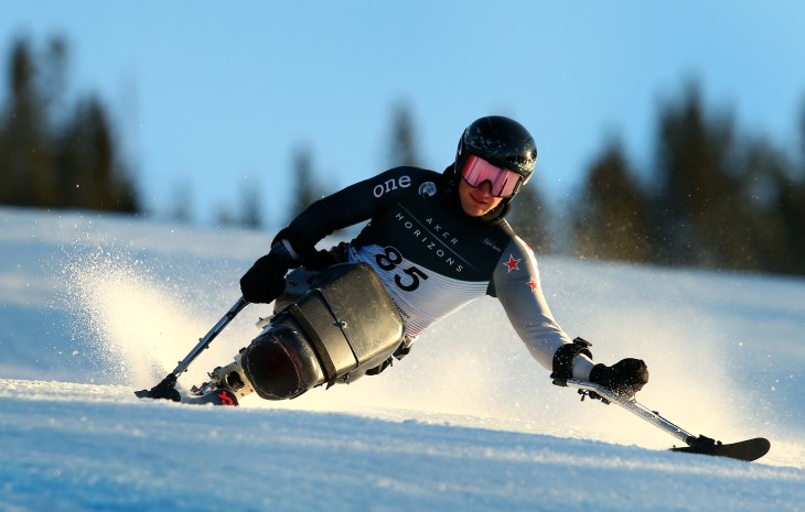 Aaron Ewen sit-skiing