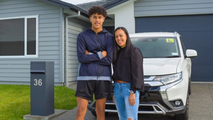 Mum poses with learner teenage driver