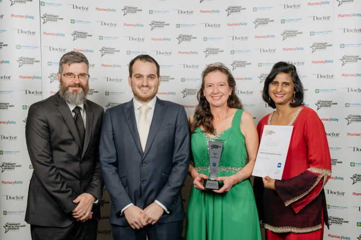 Four people at the primary healthcare award ceremony