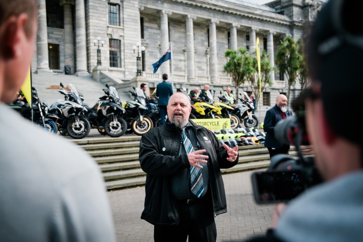 Dave Keilty talks to people at the launch of Motorcycle Awareness Month on the steps of Parliament