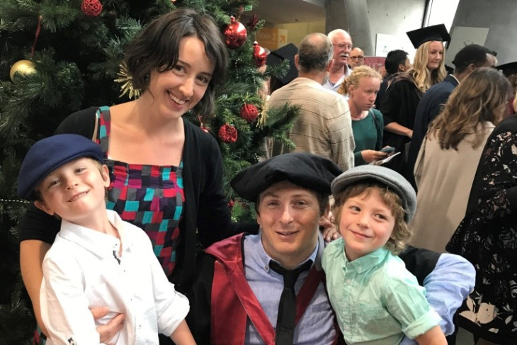 Dr Johnny Bourke surrounded by his family at his PhD graduation ceremony..
