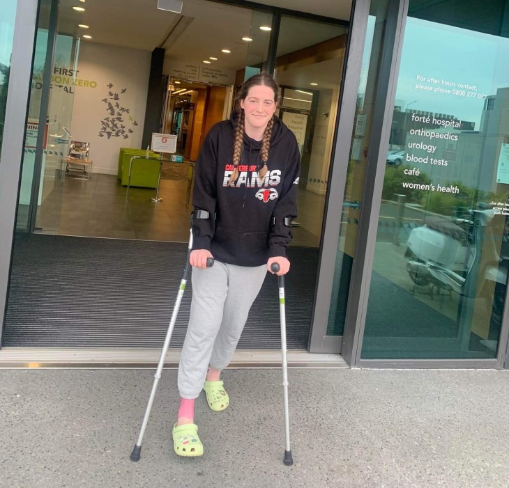 Lauren leaving the hospital following her ACL injury.