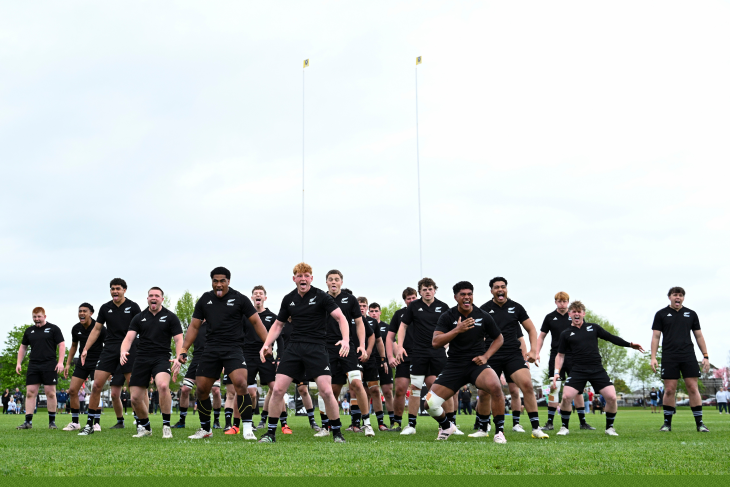 Charlie Sinton performing a haka with the New Zealand secondary schools rugby team before a game.