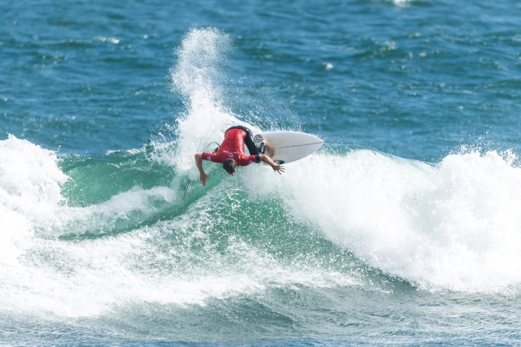 Jay Piper-Healion surfing on a wave.