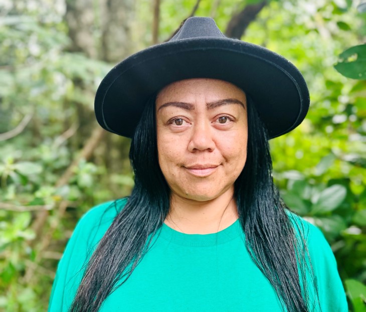 A close-up photo of rongoā Māori practitioner Nalini Cook wearing a hat.