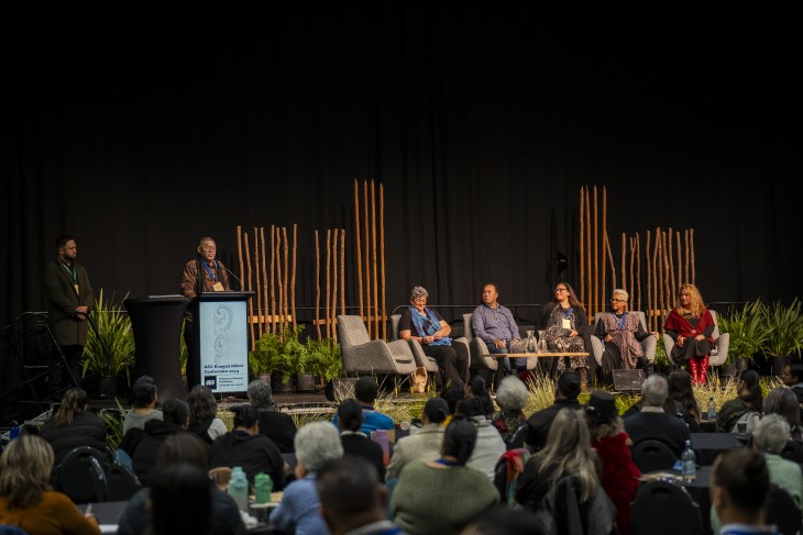 A speaking panel on stage at the ACC Rongoā Māori Conference. 