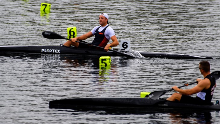 Scott Martlew crosses the finish line in his Para canoe during a race. 