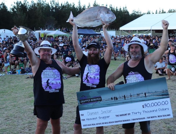 Several winners from last year's Snapper Bonanza pose with their fish and prizes.