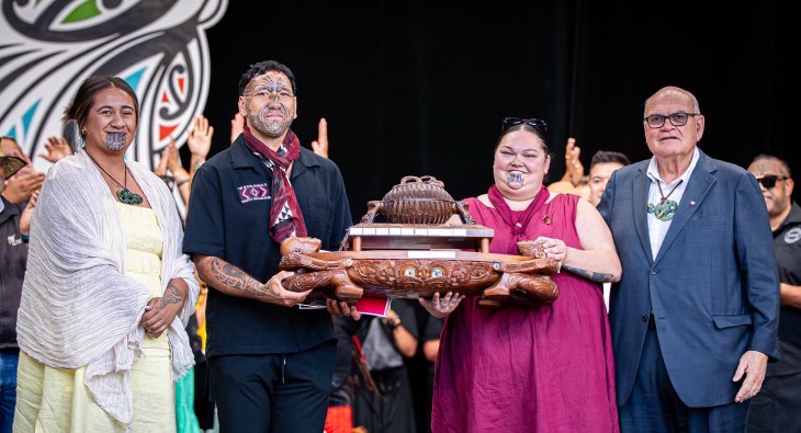 Te Kapa Haka o Ngāti Whakaue receive their award for becoming champions of Te Matatini. 